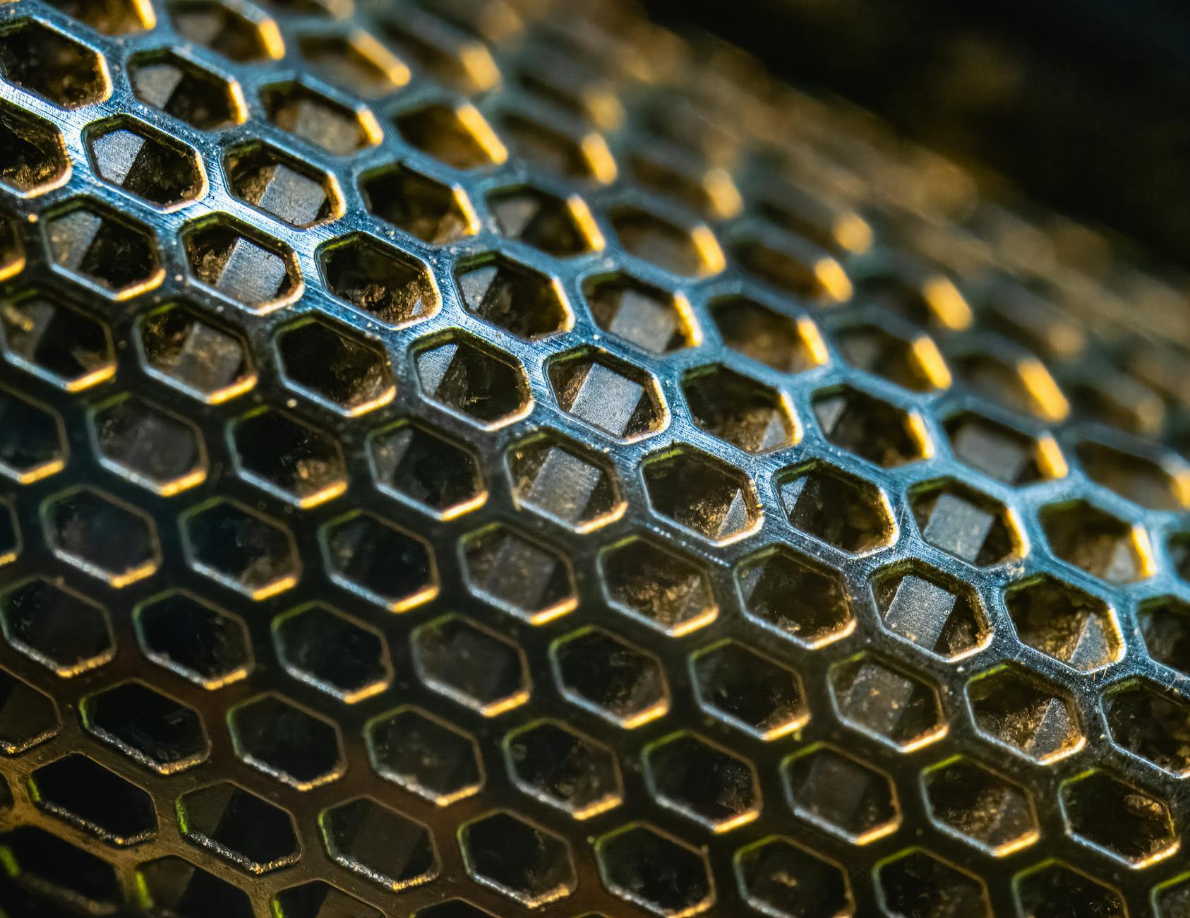 close up of honeycomb metal structure texture